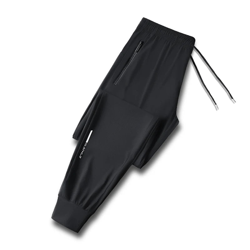 Men's solid color pants summer ice silk elastic quick drying loose sports pants suitable for casual and business wear M-8XL