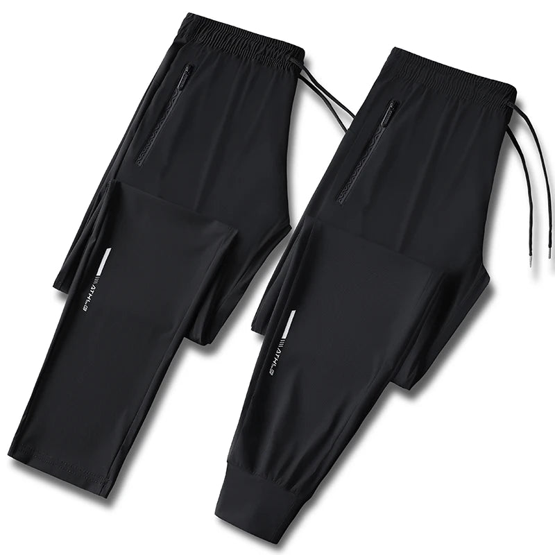 Men's solid color pants summer ice silk elastic quick drying loose sports pants suitable for casual and business wear M-8XL