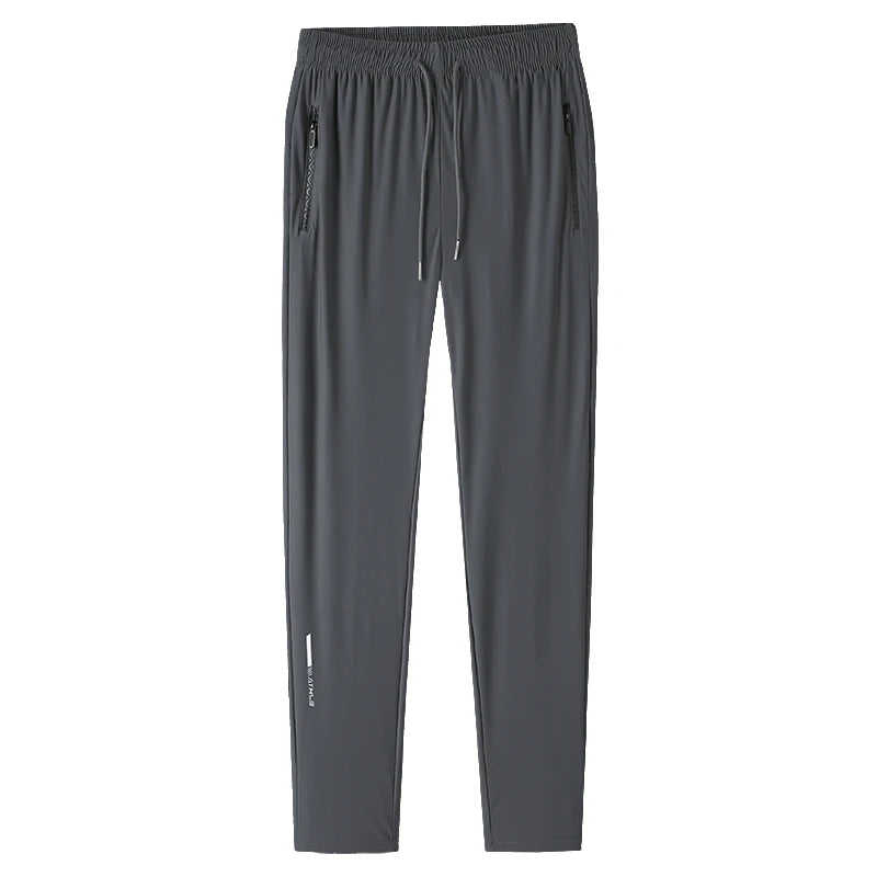 Men's solid color pants summer ice silk elastic quick drying loose sports pants suitable for casual and business wear M-8XL